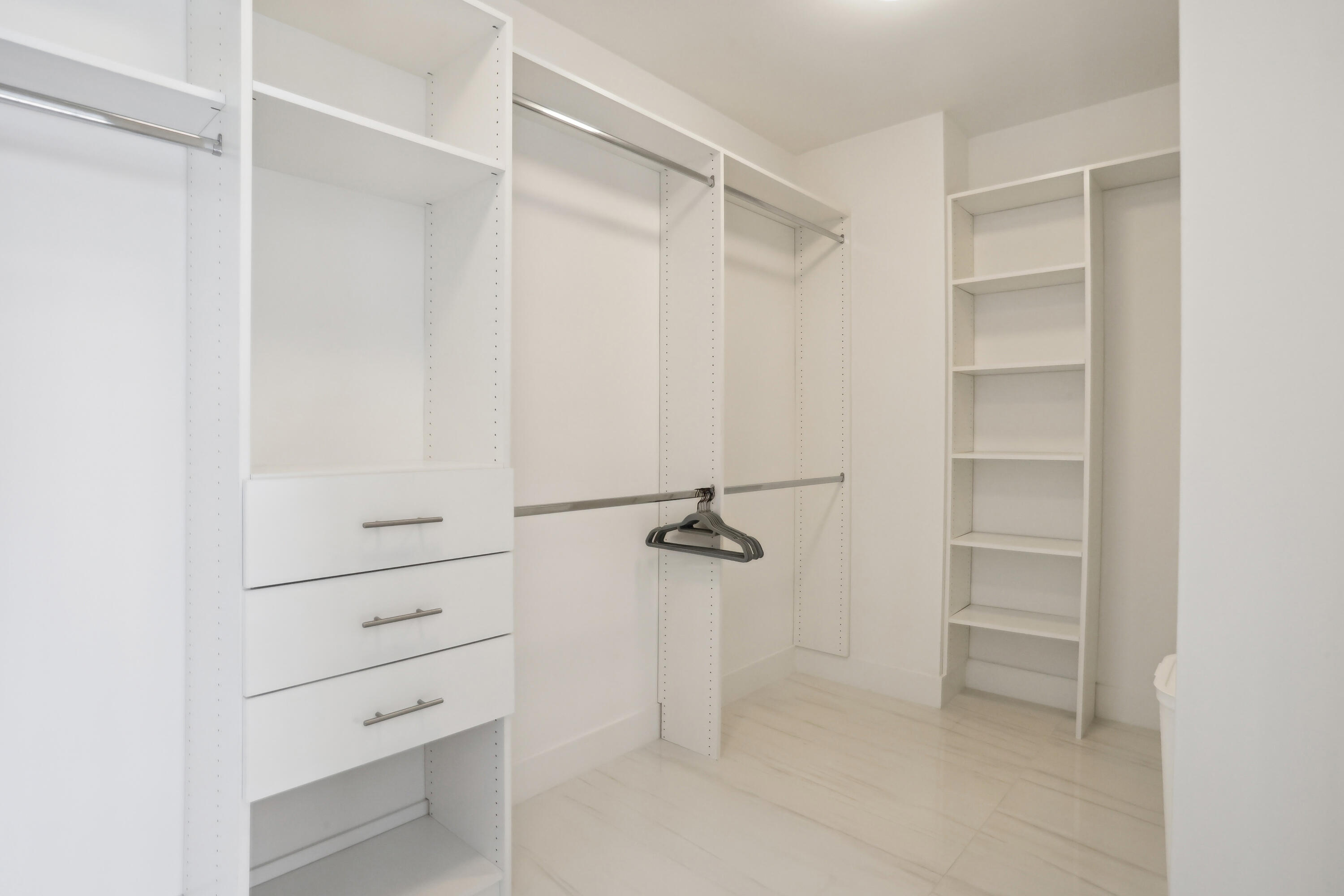155 East Boca Raton Road, Unit 1114 Boca Raton, FL 33432 - Photo 19 of 61 Primary Suite Closet