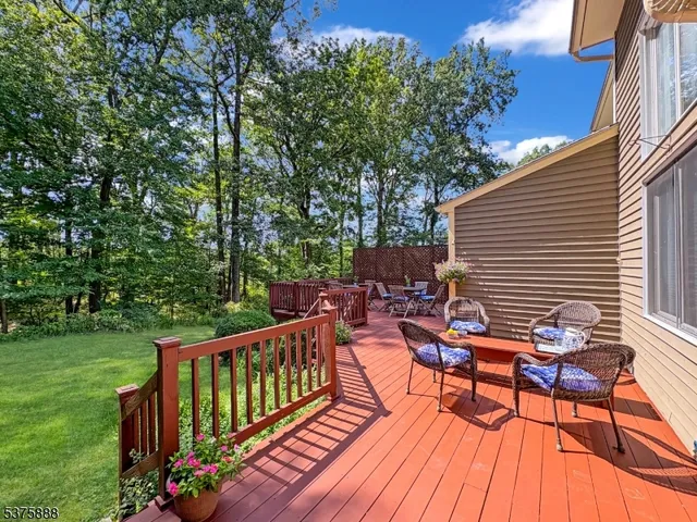 a view of a chairs and table in the patio