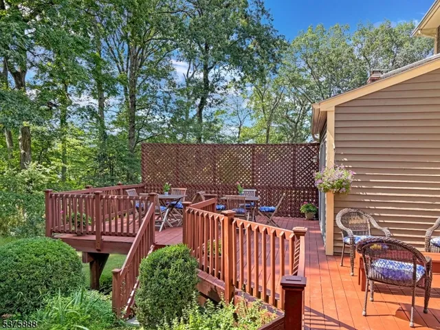 a view of a roof with sitting area