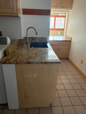 a view of empty room with windows