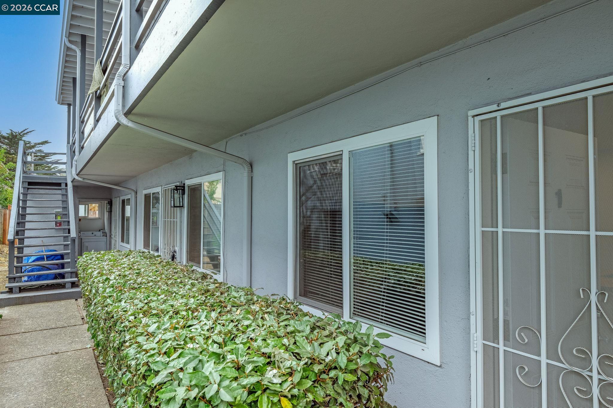 1926 Alcatraz Avenue, Unit 2 Berkeley, CA 94703 - Photo 3 of 13 front view of a house with a large window