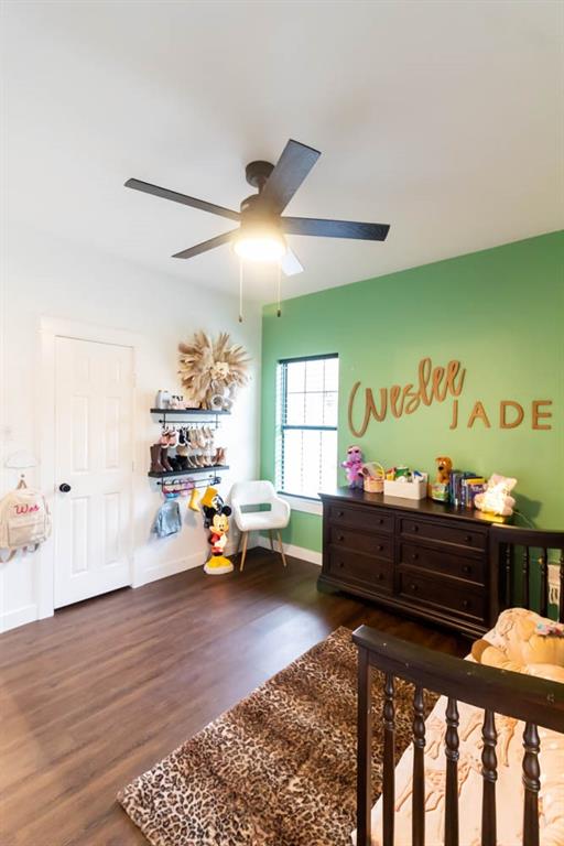 10800 Estate Lane Terrell, TX 75161 - Photo 16 of 30 a bed room with furniture and window