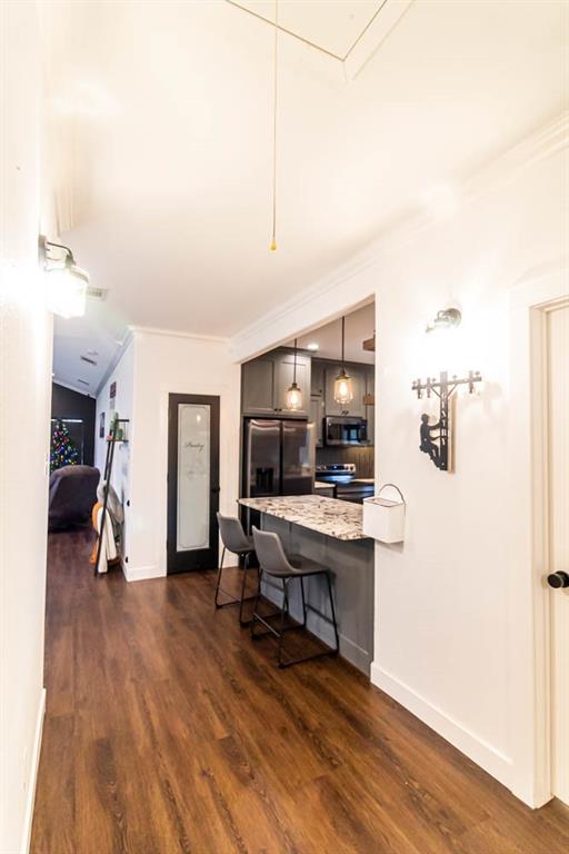 10800 Estate Lane Terrell, TX 75161 - Photo 23 of 30 a living room with furniture and a flat screen tv