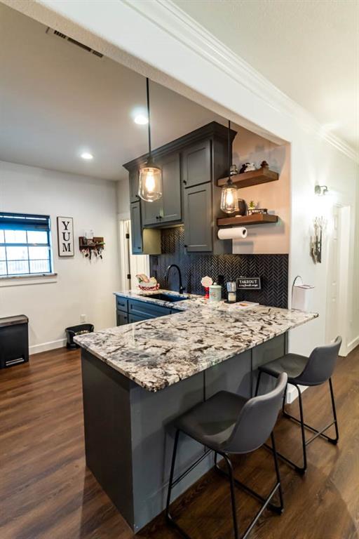 10800 Estate Lane Terrell, TX 75161 - Photo 26 of 30 a kitchen with a table and chairs in it