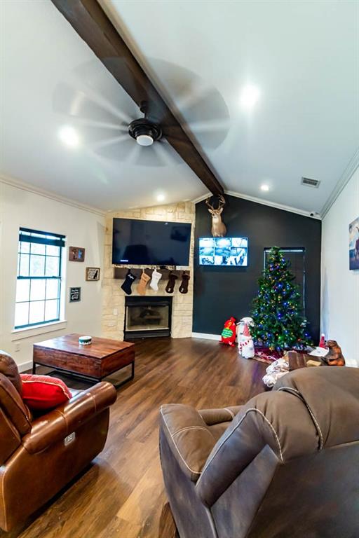 10800 Estate Lane Terrell, TX 75161 - Photo 6 of 30 a living room with furniture fireplace and flat screen tv