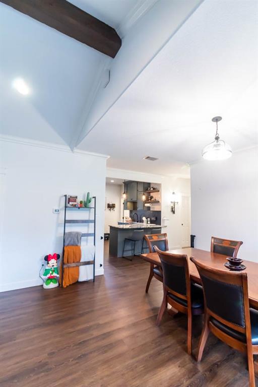 10800 Estate Lane Terrell, TX 75161 - Photo 8 of 30 a work room with furniture and wooden floor