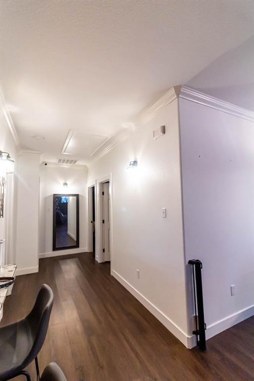 10800 Estate Lane Terrell, TX 75161 - Photo 10 of 30 a view of a hallway with wooden floor