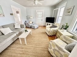 53 A Street Hull, MA 02045 - Photo 5 of 19 a living room with furniture and a flat screen tv