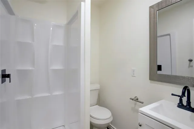 a view of room that has windows