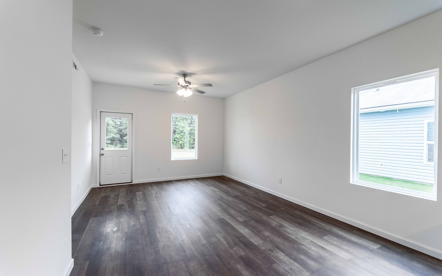 77 Stonehenge Lane Manchester, TN 37355 - Photo 13 of 16 wooden floor in an empty room with a window