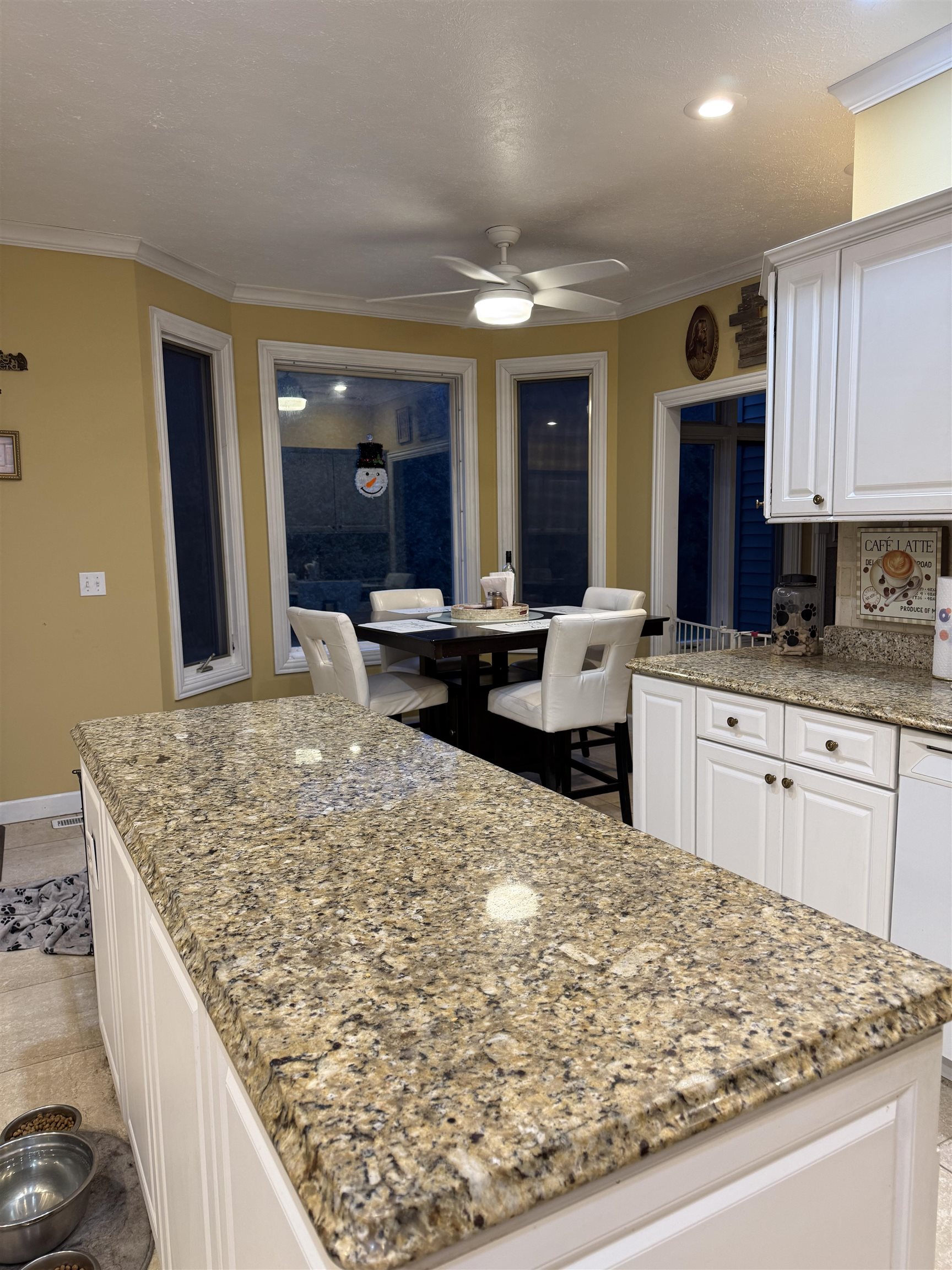 649 Roxbury Road Rockford, IL 61107 - Photo 13 of 19 a large kitchen with kitchen island a sink stove and refrigerator