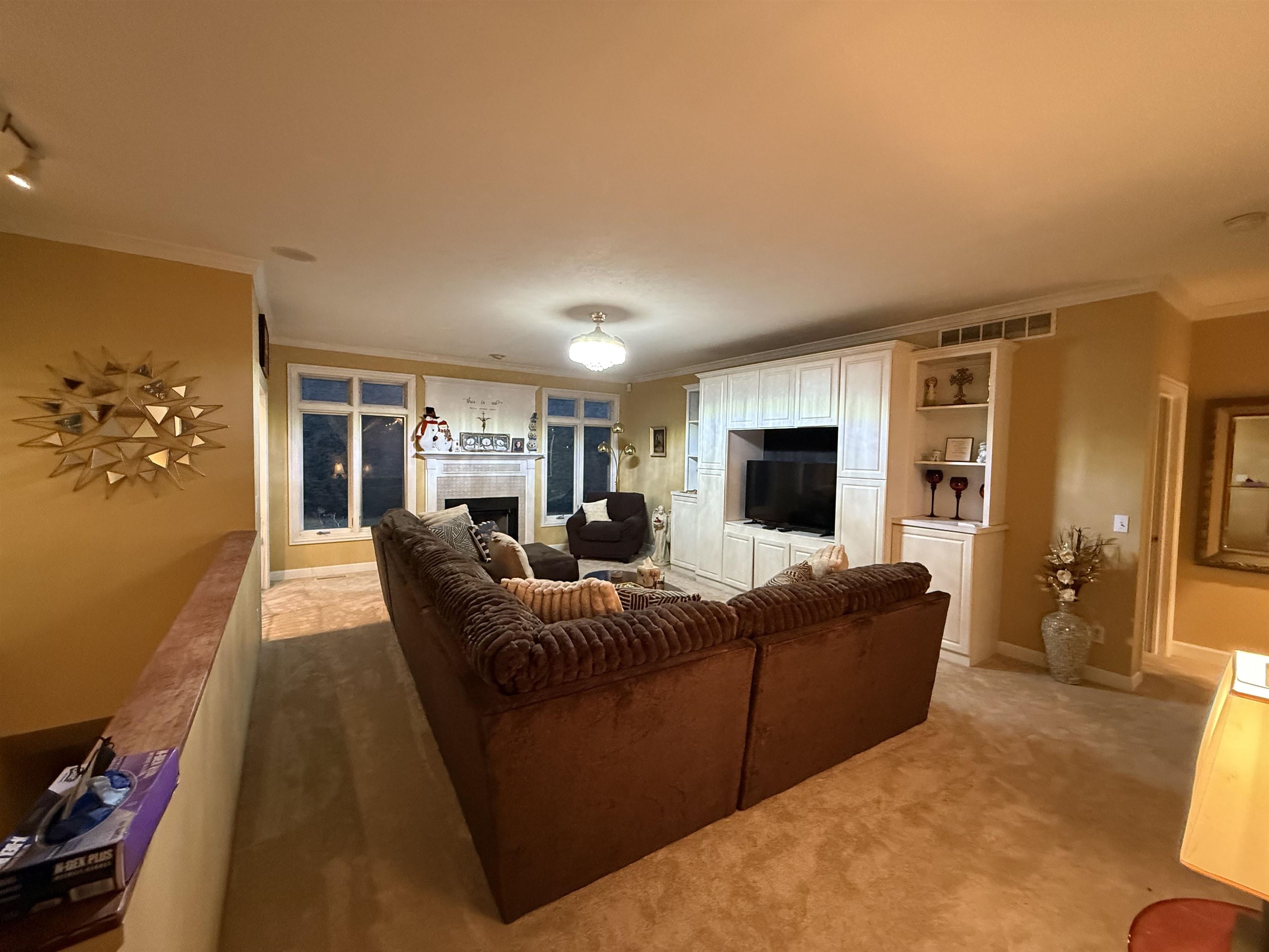 649 Roxbury Road Rockford, IL 61107 - Photo 8 of 19 a living room with furniture and a flat screen tv