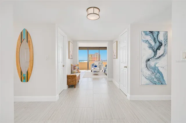 a view of a living room and a wooden floor
