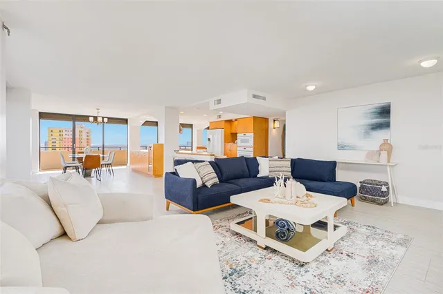 a living room with furniture and a table