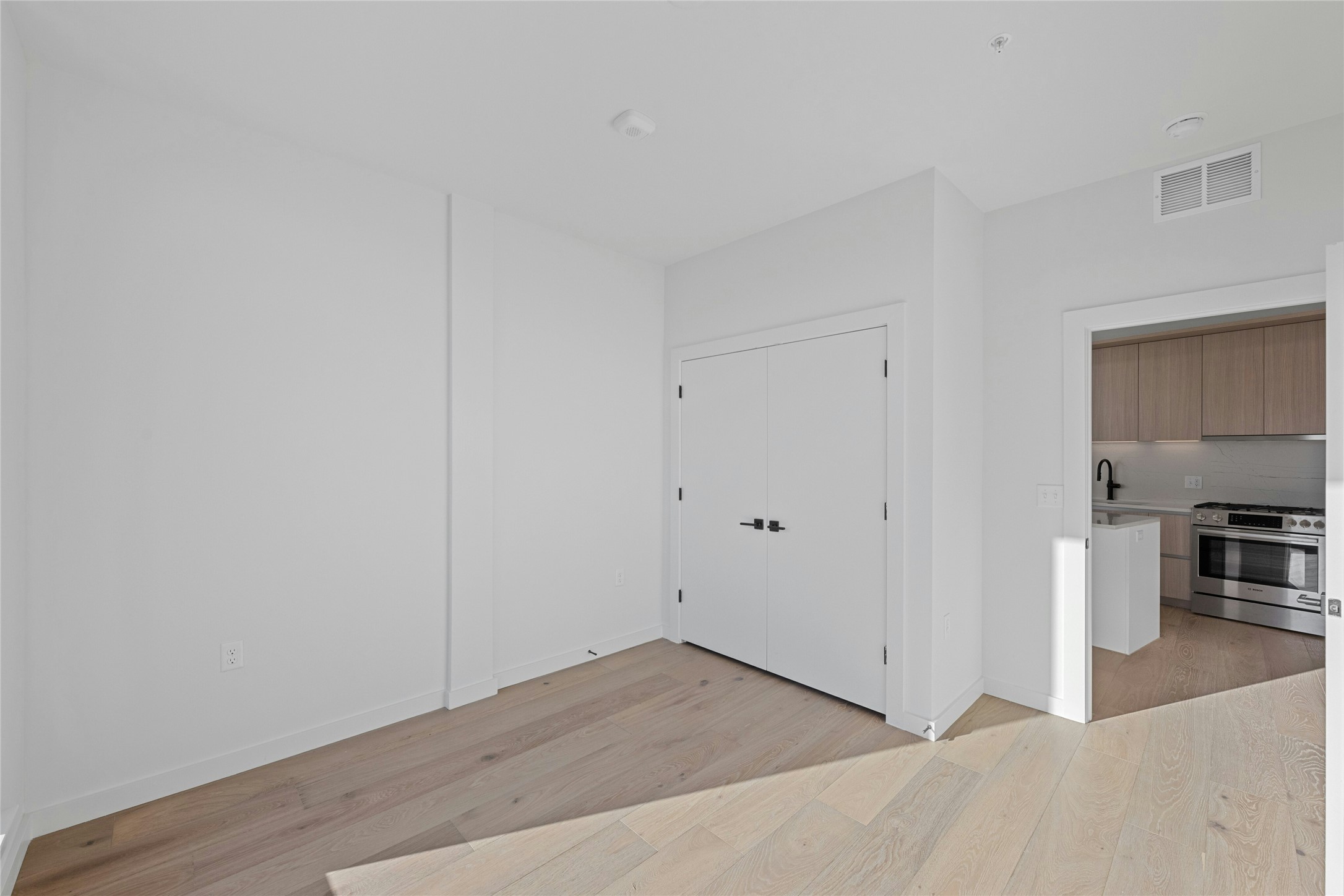 2209 South 1st Street, Unit 321 Austin, TX 78704 - Photo 22 of 40 a view of livingroom with hardwood floor and a sink