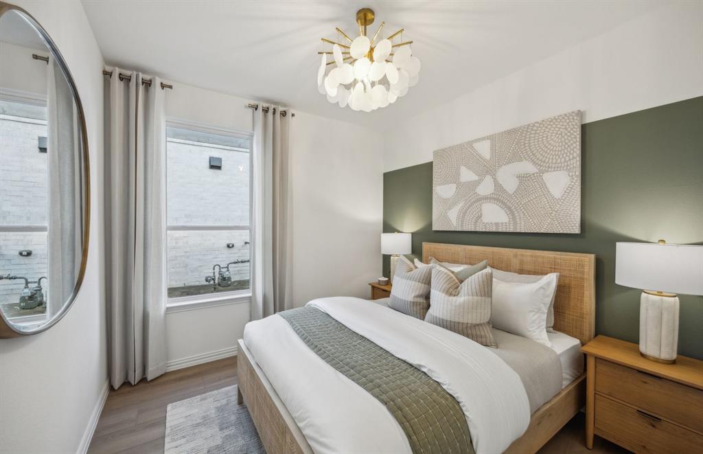 413 Snowbird Way McKinney, TX 75071 - Photo 12 of 14 Spacious secondary bedroom with large windows *Model Representation*