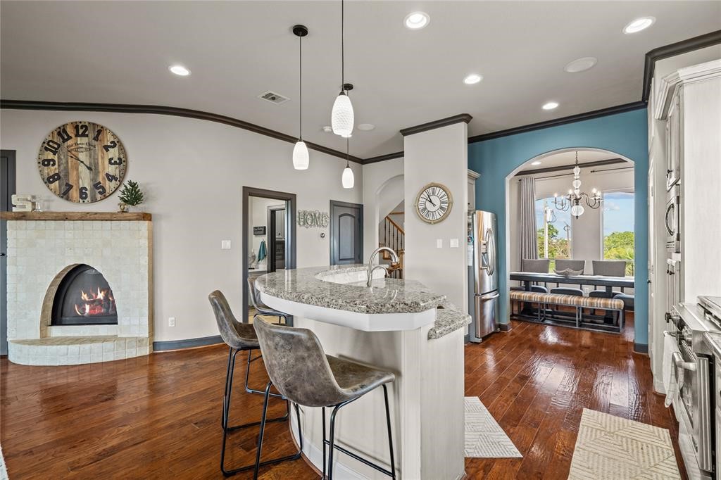 607 28th Street San Leon, TX 77539 - Photo 20 of 44 a view of a dining room with furniture and wooden floor