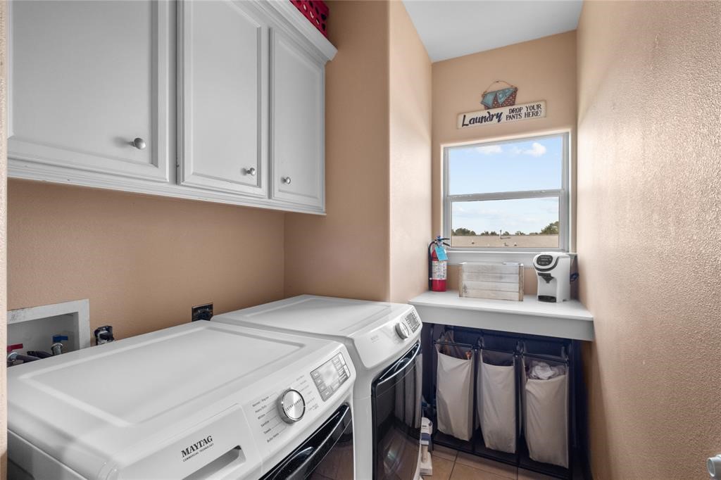 607 28th Street San Leon, TX 77539 - Photo 30 of 44 a utility room with dryer and washer