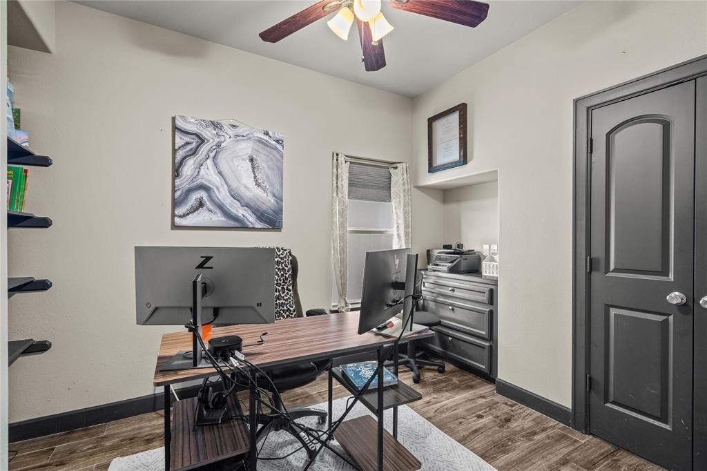 607 28th Street San Leon, TX 77539 - Photo 8 of 44 a workspace with furniture and wooden floor