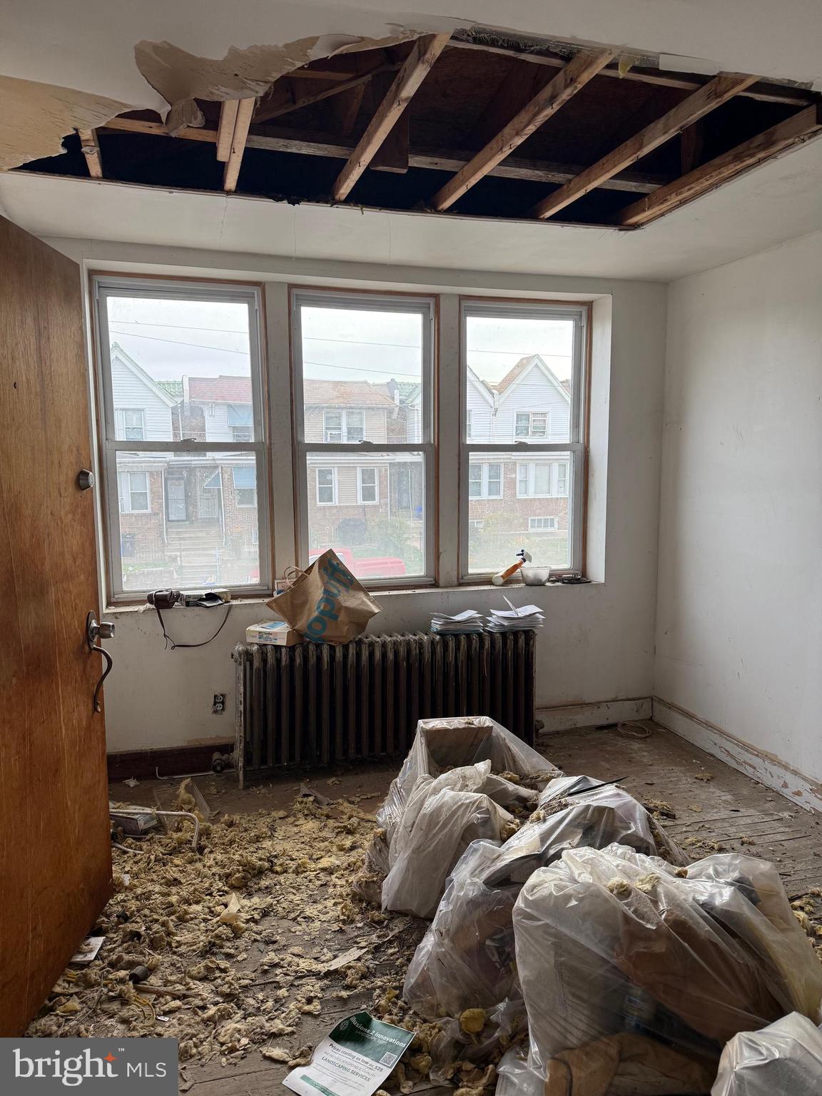 6726 Wyncote Avenue Philadelphia, PA 19138 - Photo 20 of 35 a bed sitting in a bedroom next to a window