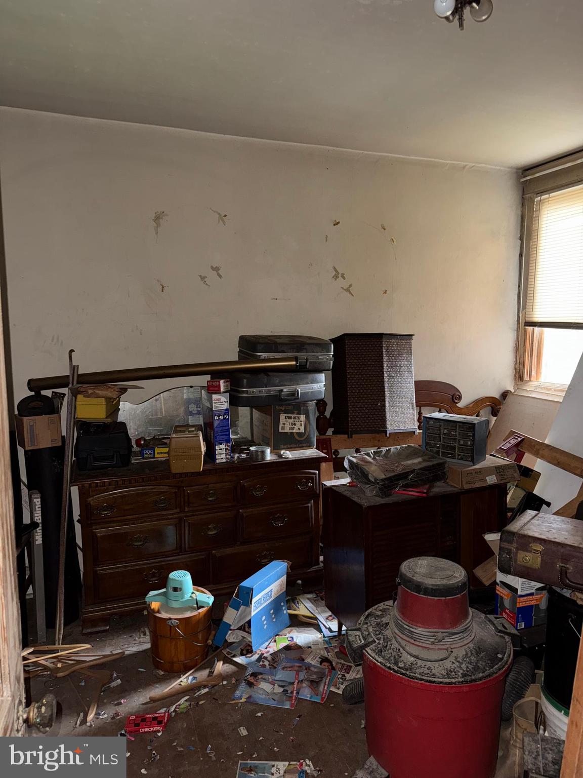 6726 Wyncote Avenue Philadelphia, PA 19138 - Photo 24 of 35 a living room with hard wood flooring and a fireplace