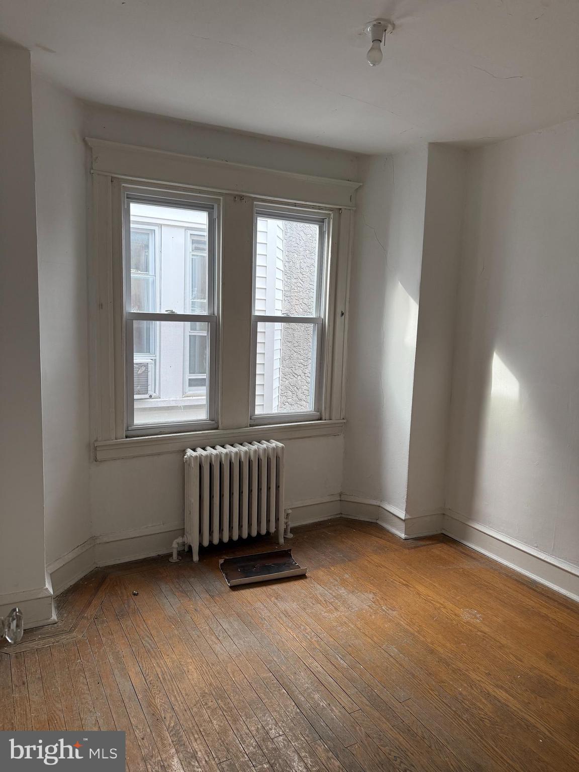 6726 Wyncote Avenue Philadelphia, PA 19138 - Photo 8 of 35 an empty room with windows