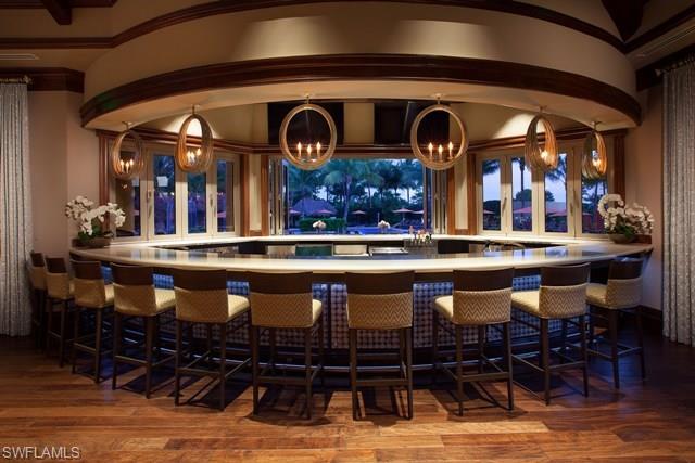 6189 Bunker Place Naples, FL 34113 - Photo 20 of 25 a view of a chairs and table in a patio