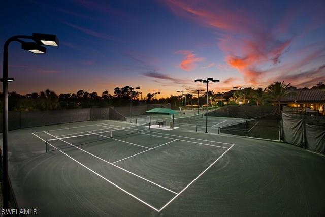 6189 Bunker Place Naples, FL 34113 - Photo 24 of 25 a view of a tennis court