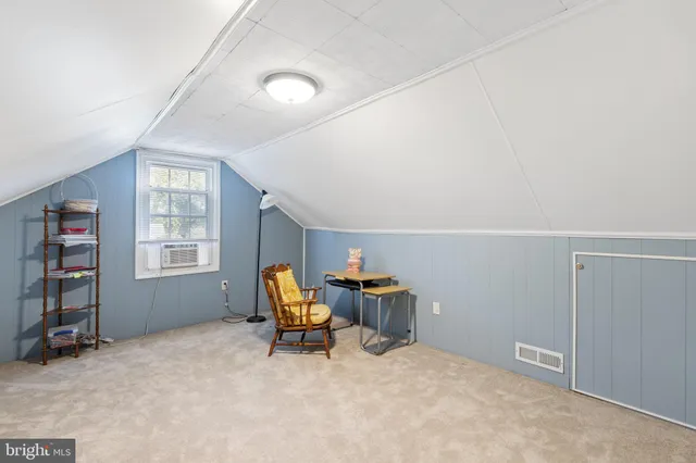 a workspace with furniture and window