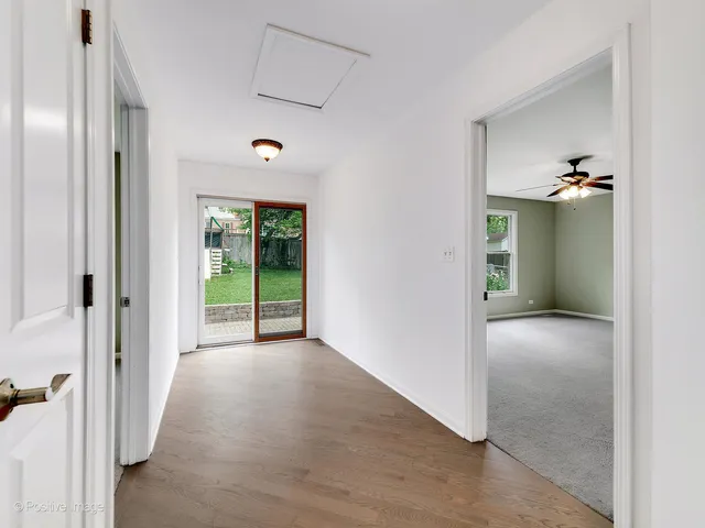 a view of entryway with wooden floor