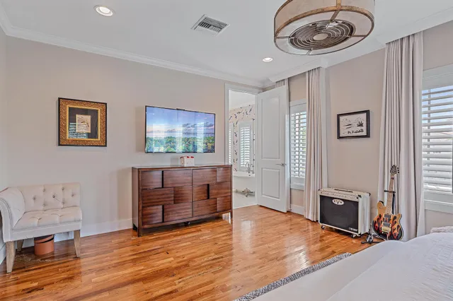 a bathroom with a bathtub and a shower curtain