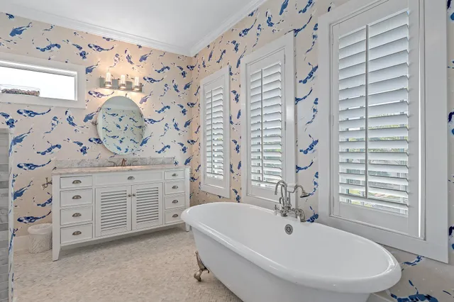 a bathroom with a bathtub sink and toilet