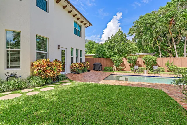 a view of a house with swimming pool