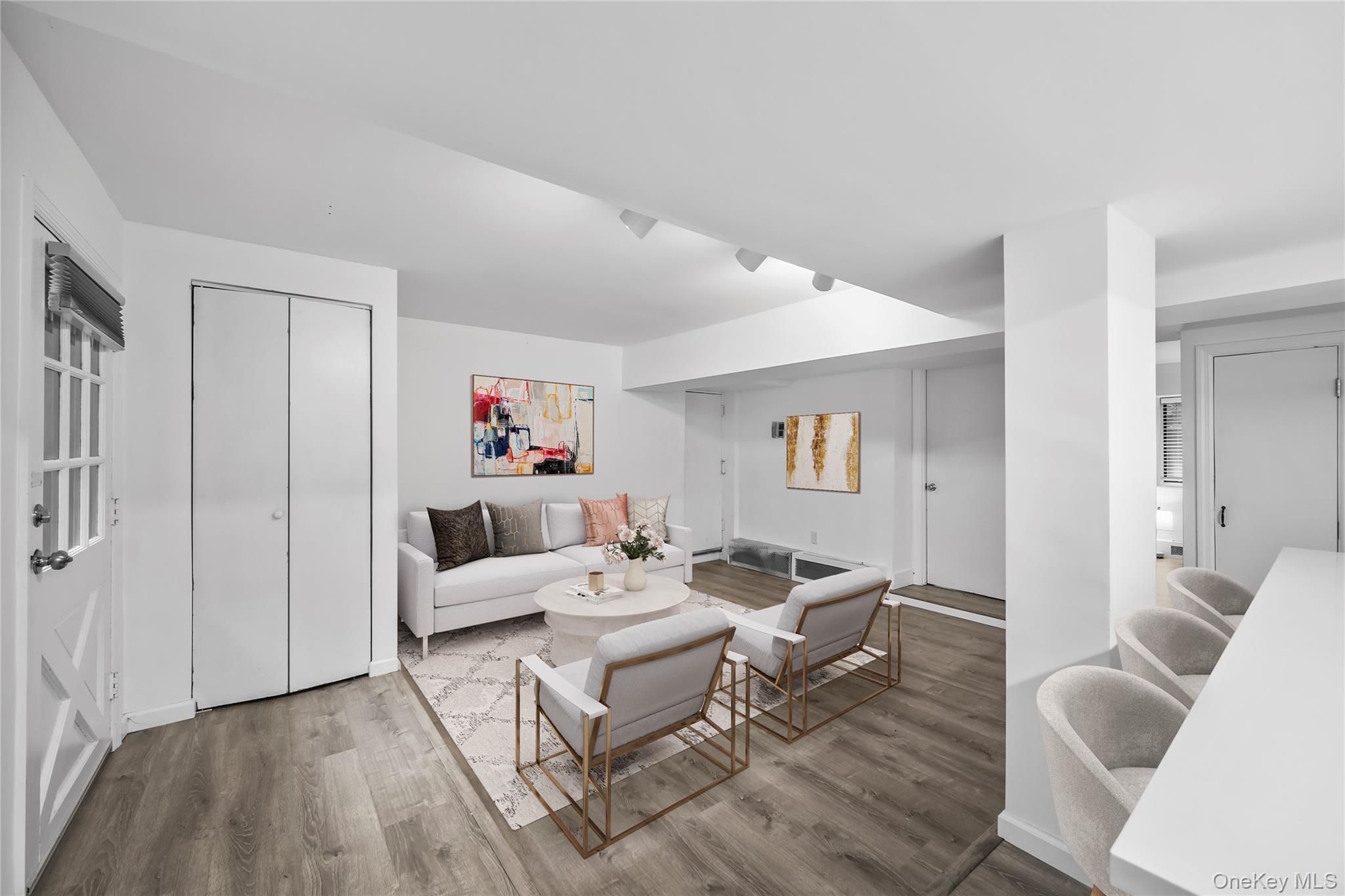 1440 Boston Post Road, Unit 8K Larchmont, NY 10538 - Photo 3 of 20 Living room with wood finished floors