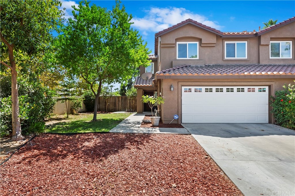 277 Cape Elizabeth Way Riverside, CA 92506 - Photo 1 of 1 a front view of a house with a yard and garage