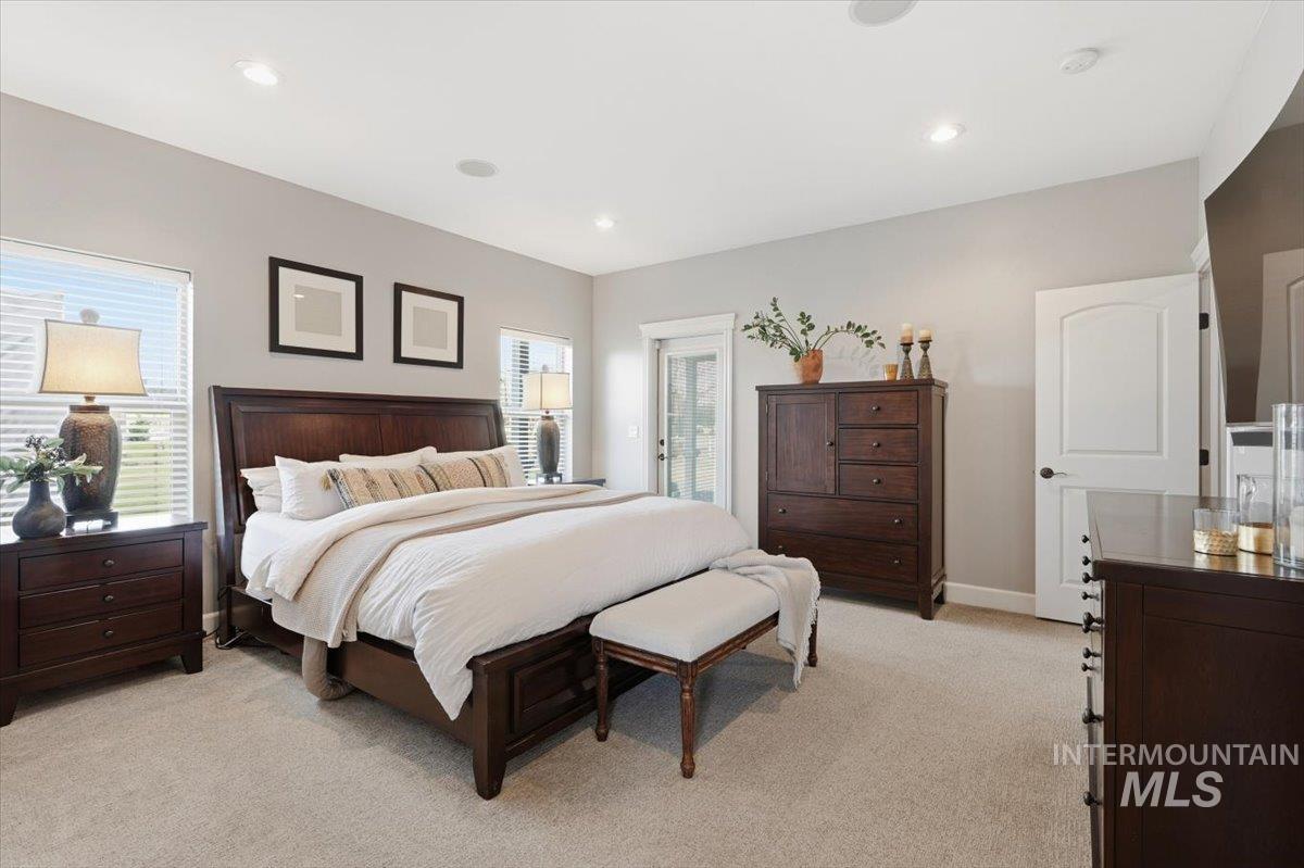 8982 New Castle Drive Middleton, ID 83644 - Photo 21 of 48 Bedroom featuring access to exterior and light carpet