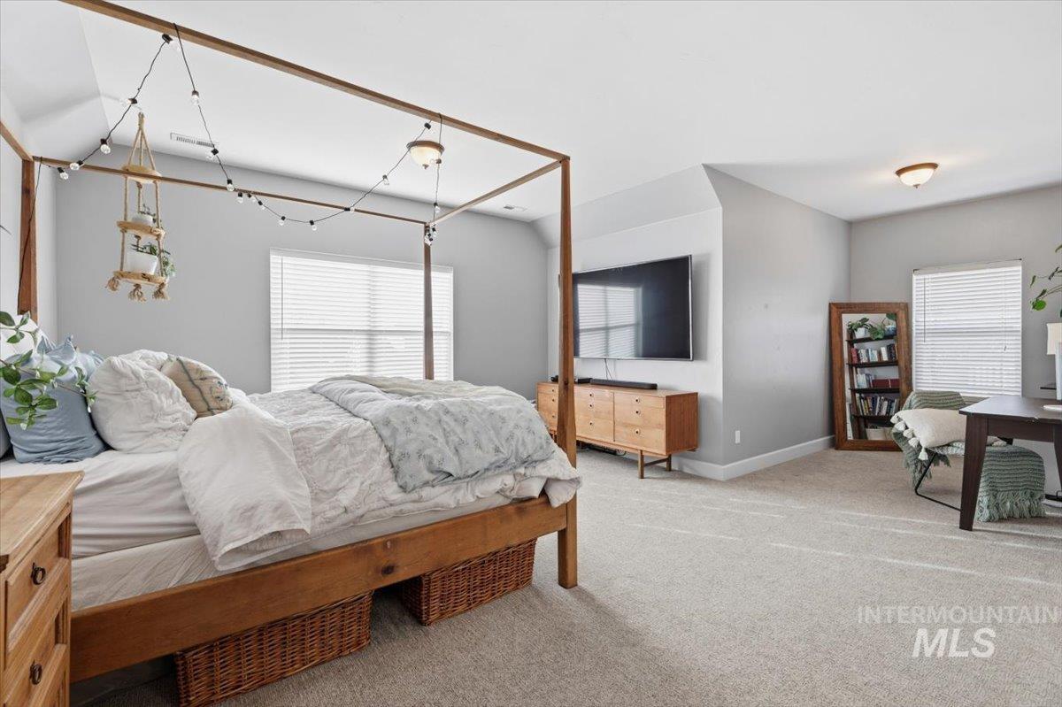 8982 New Castle Drive Middleton, ID 83644 - Photo 24 of 48 Bedroom with light colored carpet and baseboards
