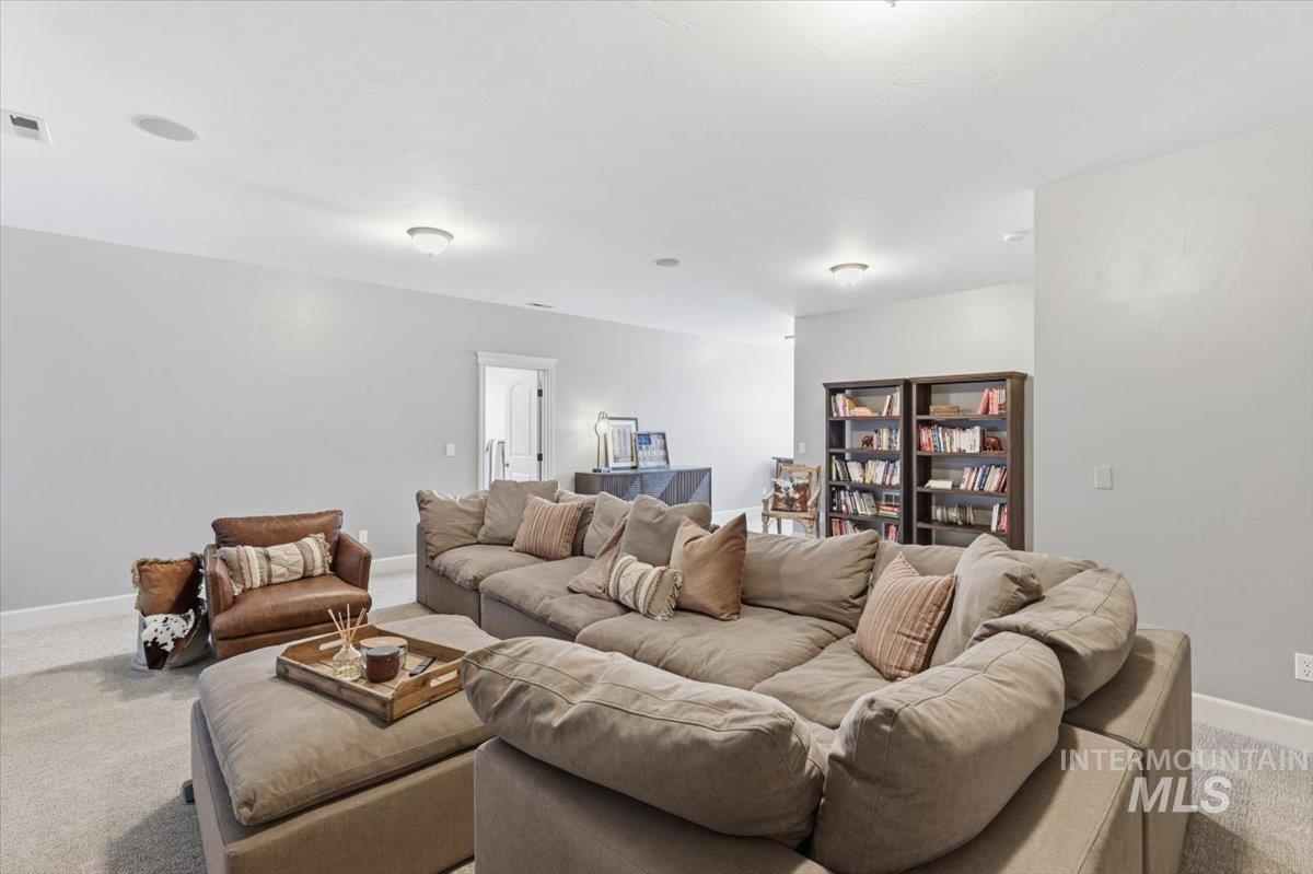 8982 New Castle Drive Middleton, ID 83644 - Photo 30 of 48 Living area with carpet and baseboards