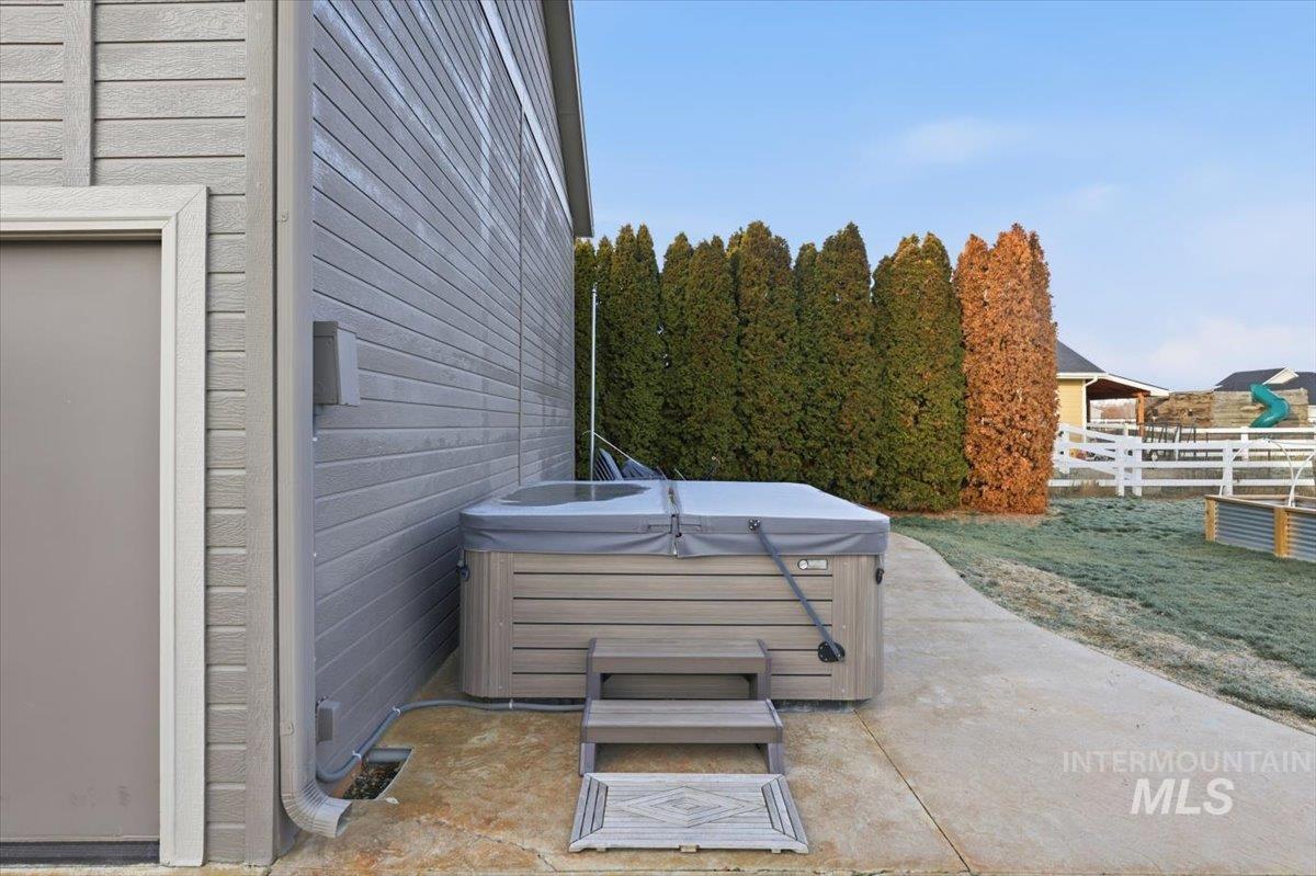 8982 New Castle Drive Middleton, ID 83644 - Photo 33 of 48 View of patio with a hot tub