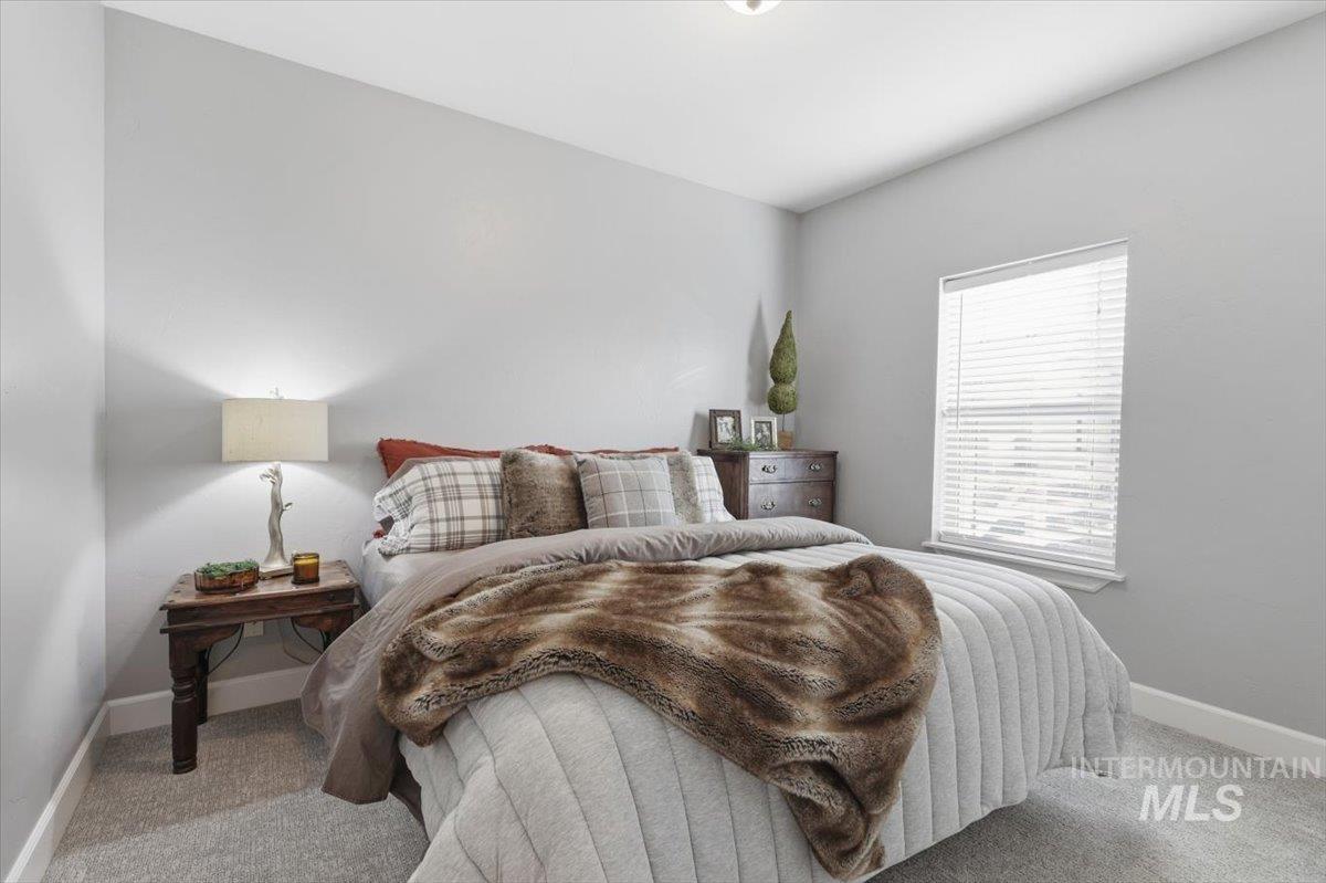 8982 New Castle Drive Middleton, ID 83644 - Photo 10 of 48 Bedroom with light carpet