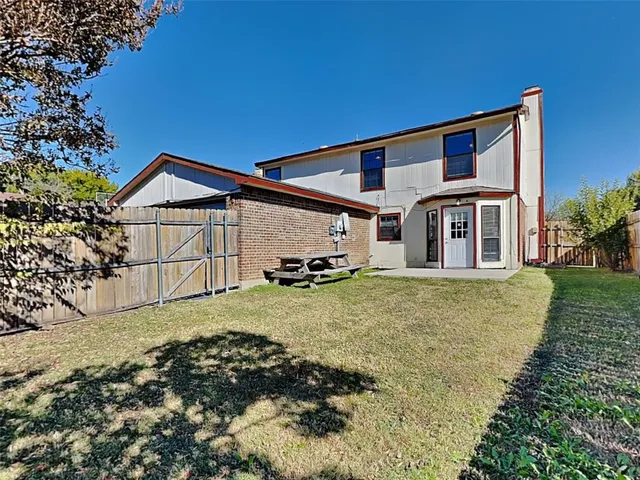 a house view with a garden space
