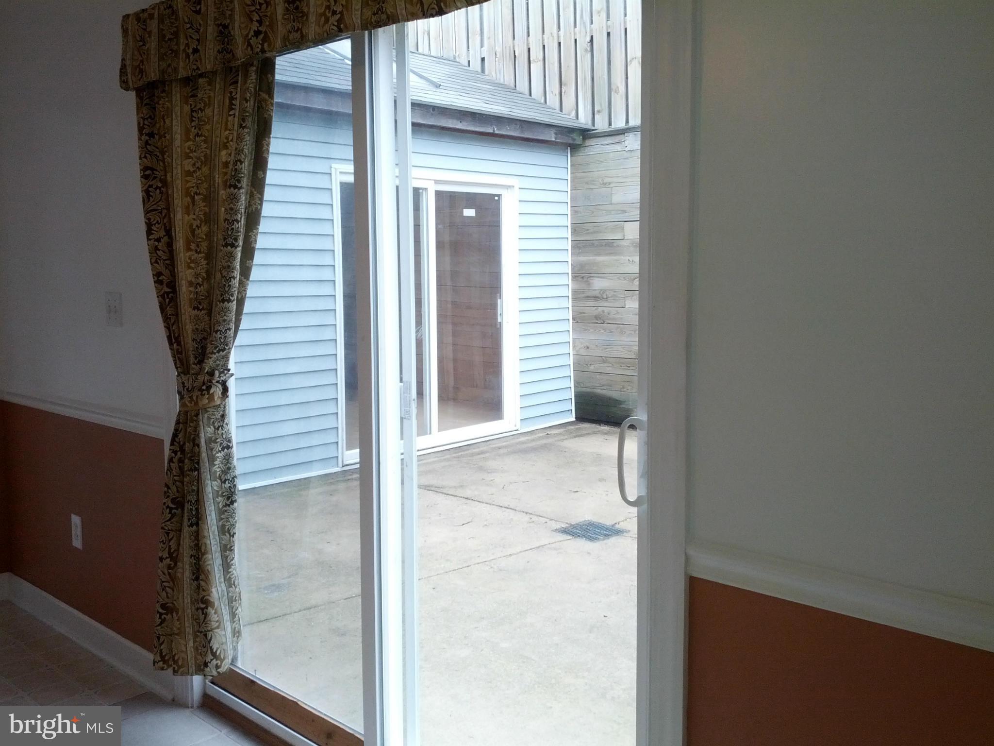 9626 Hall Road Frederick, MD 21701 - Photo 22 of 30 Sliding door to patio/courtyard