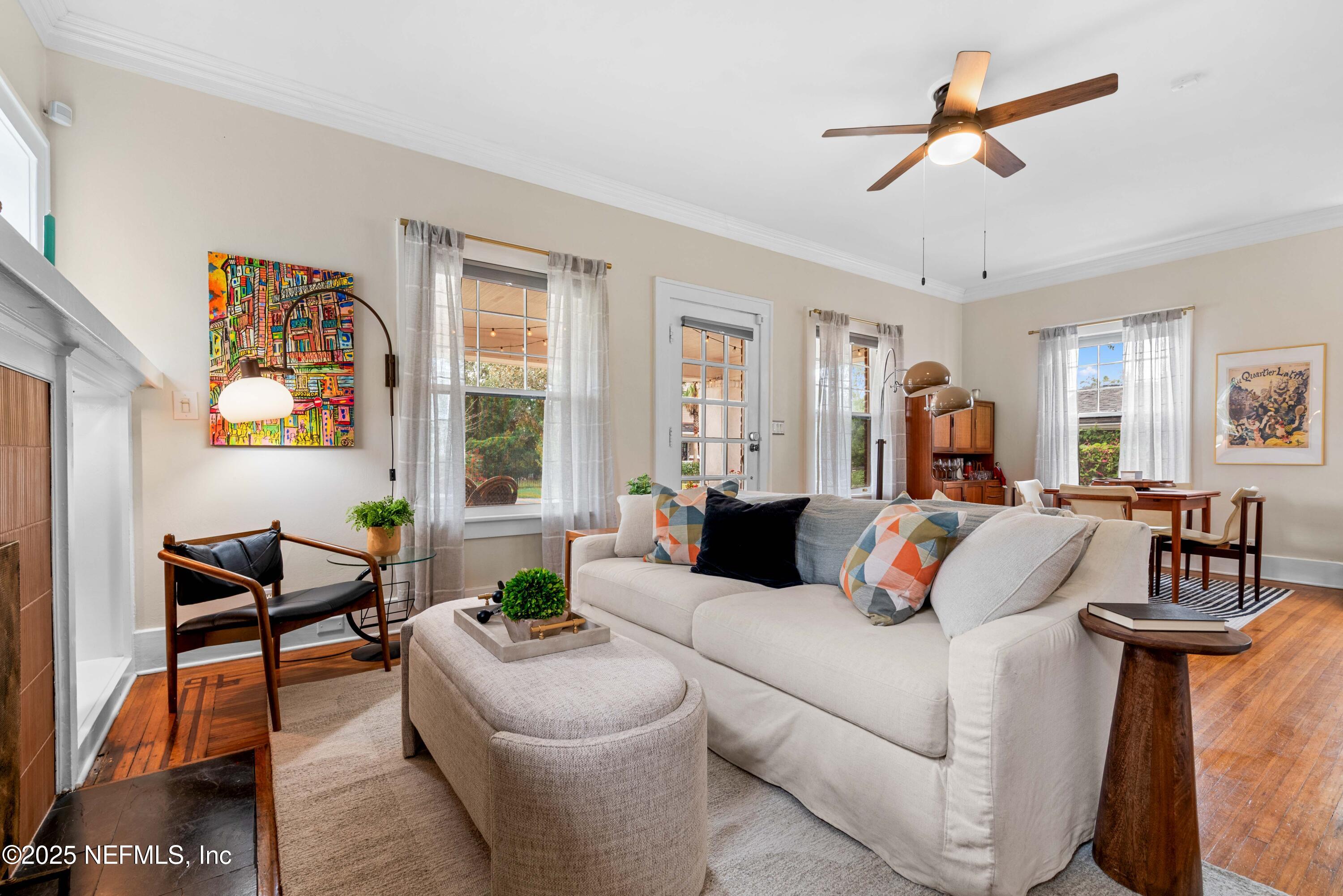 3023 Oak Street Jacksonville, FL 32205 - Photo 11 of 50 a living room with furniture and a chandelier