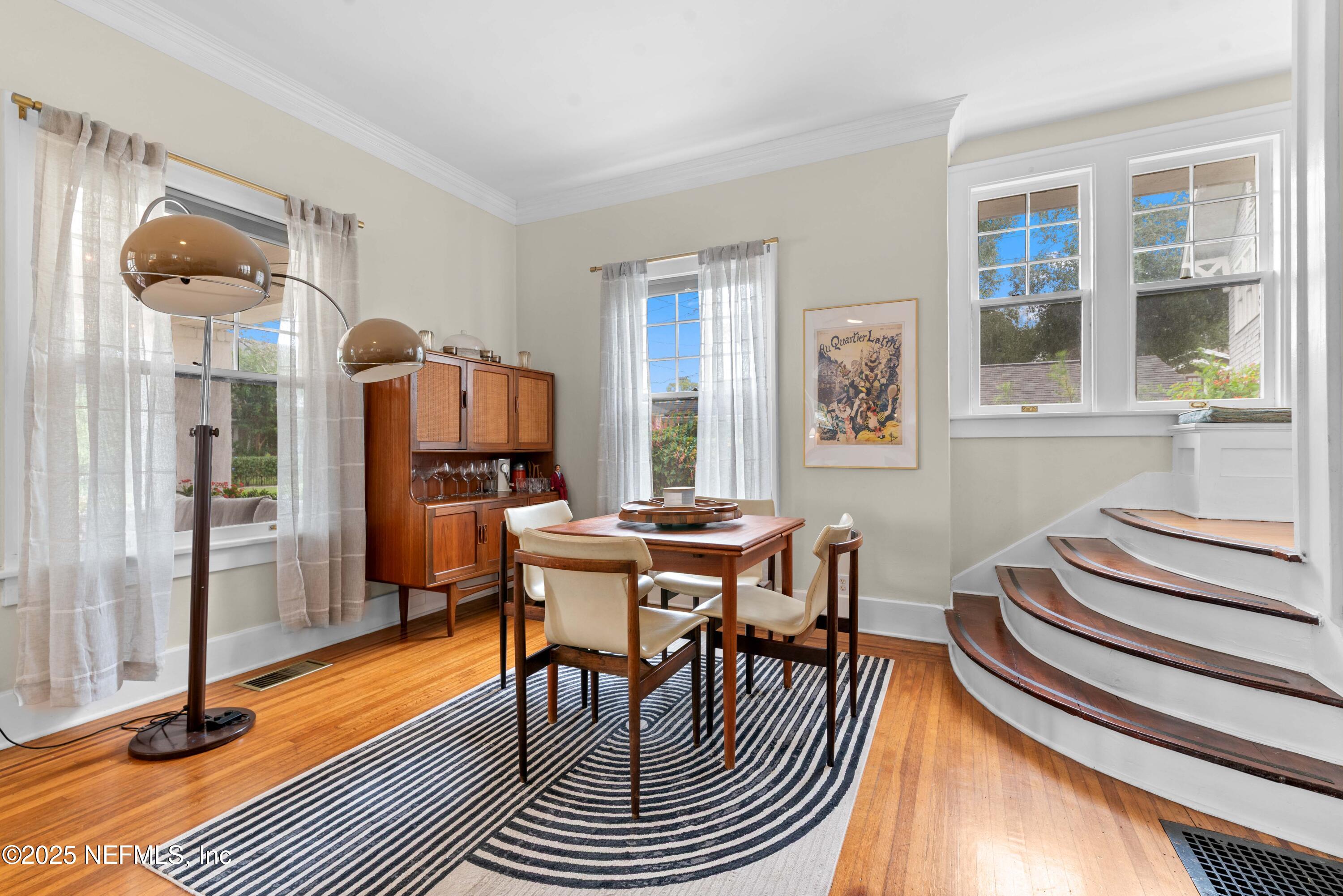 3023 Oak Street Jacksonville, FL 32205 - Photo 14 of 50 a view of a dining room with furniture window and wooden floor