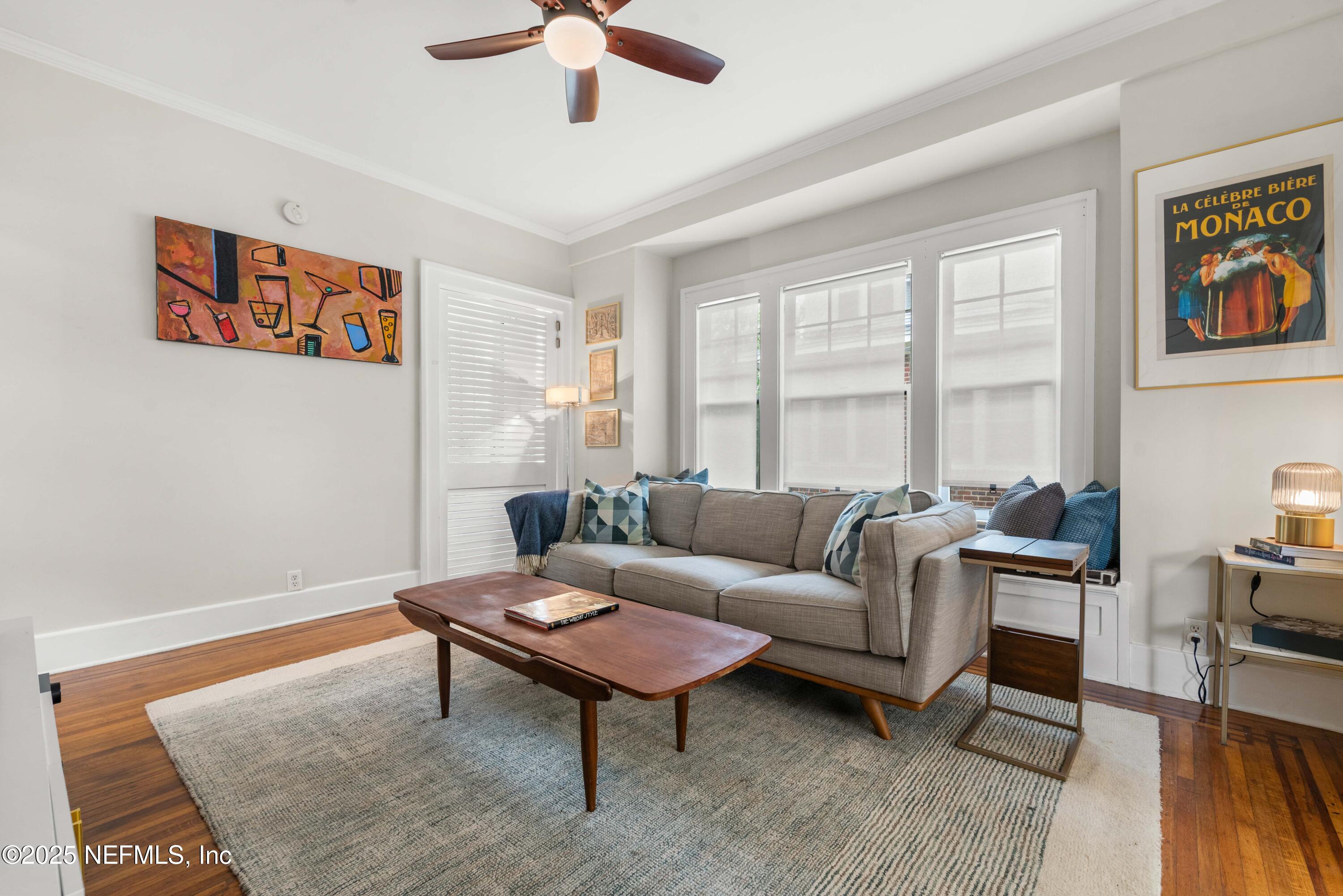 3023 Oak Street Jacksonville, FL 32205 - Photo 17 of 50 a living room with furniture a rug and a window