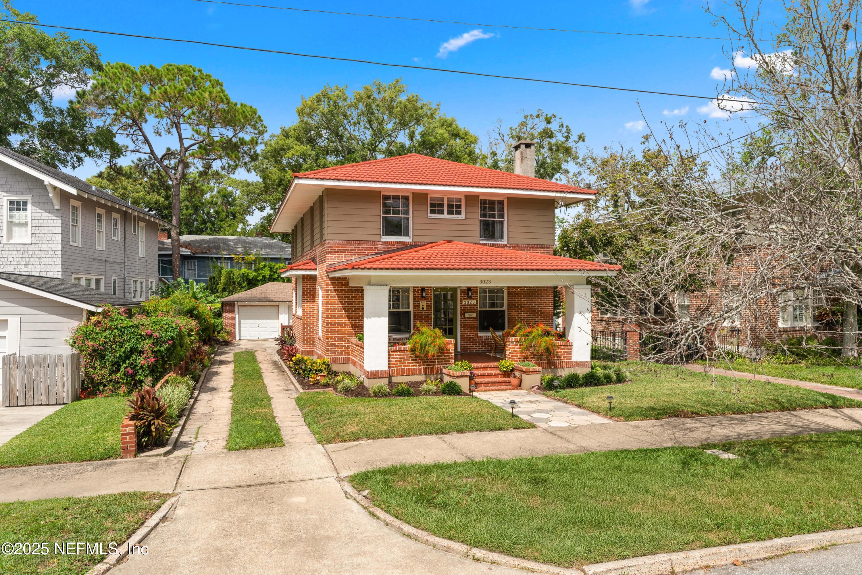 3023 Oak Street Jacksonville, FL 32205 - Photo 2 of 50 a front view of a house with garden