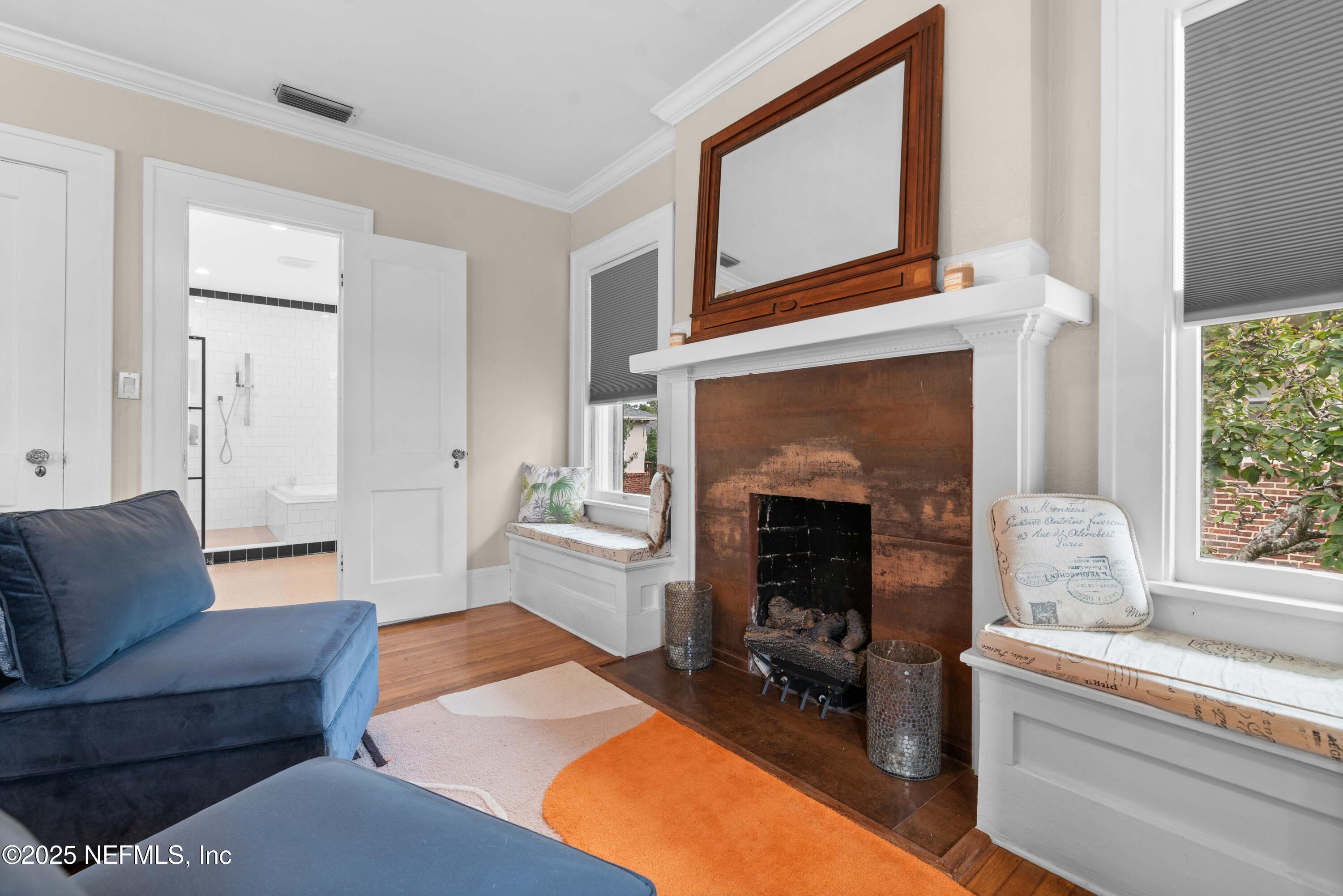 3023 Oak Street Jacksonville, FL 32205 - Photo 31 of 50 a living room with furniture and a fireplace