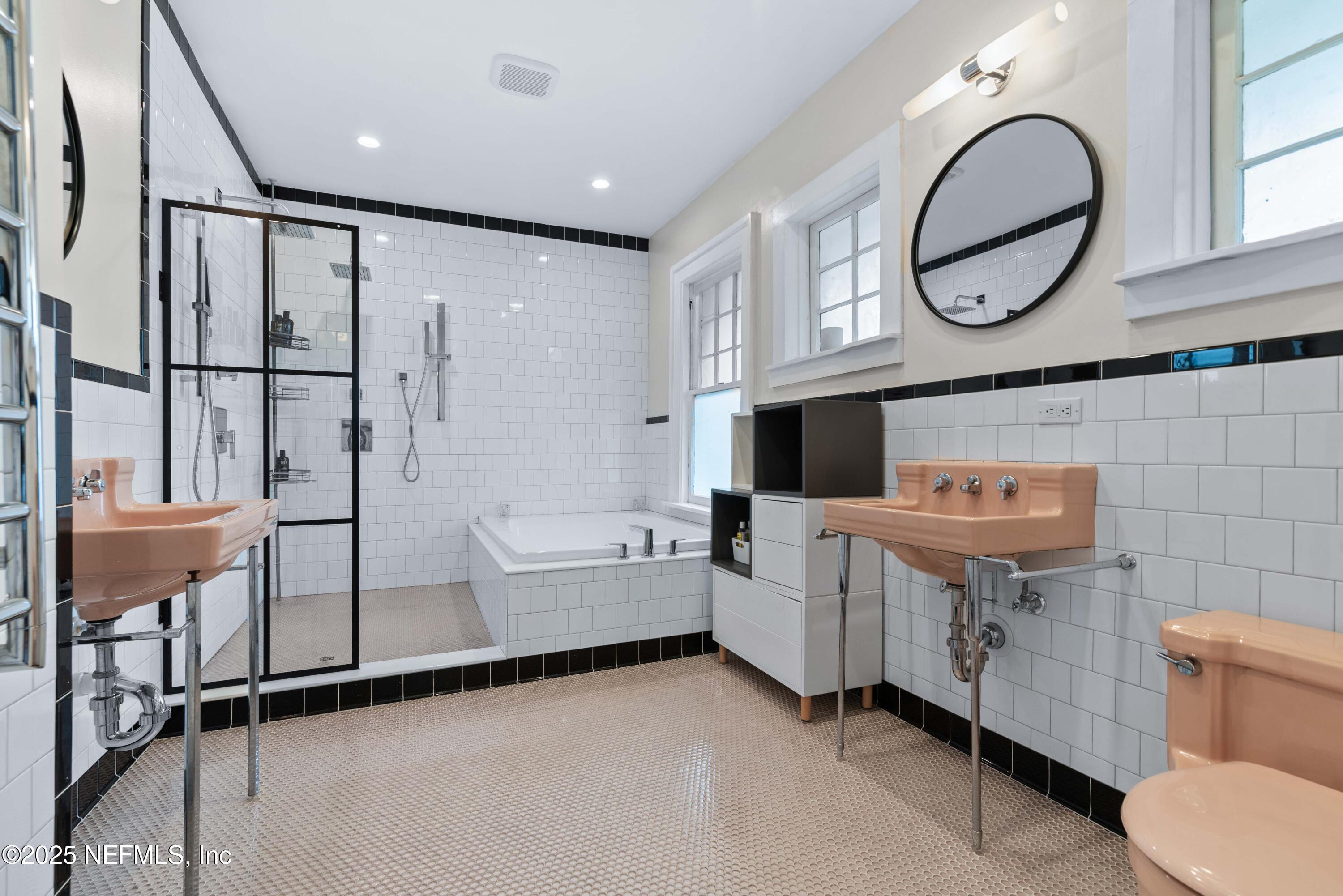 3023 Oak Street Jacksonville, FL 32205 - Photo 32 of 50 a bathroom with a toilet sink and mirror