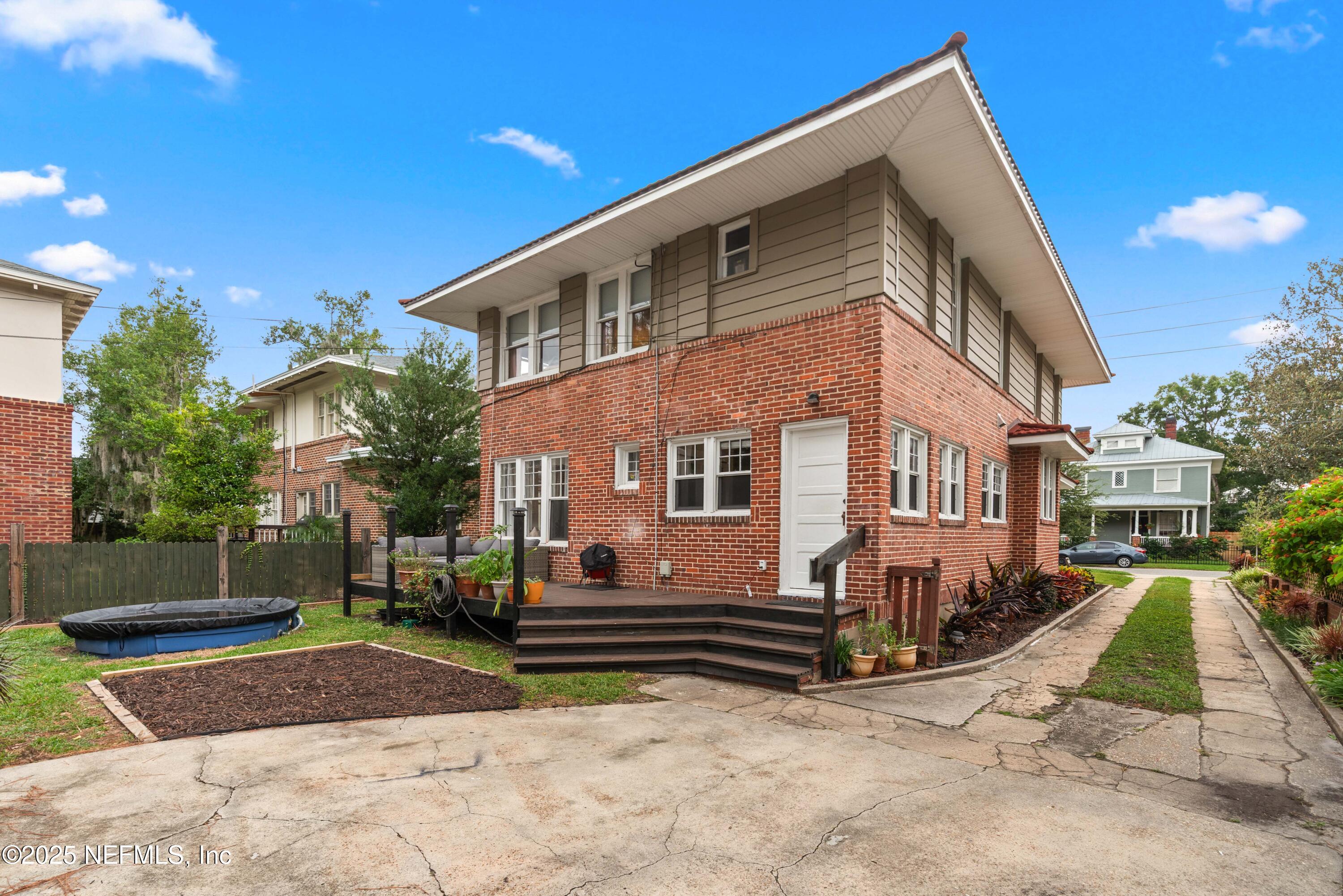 3023 Oak Street Jacksonville, FL 32205 - Photo 43 of 50 a view of a house with a yard