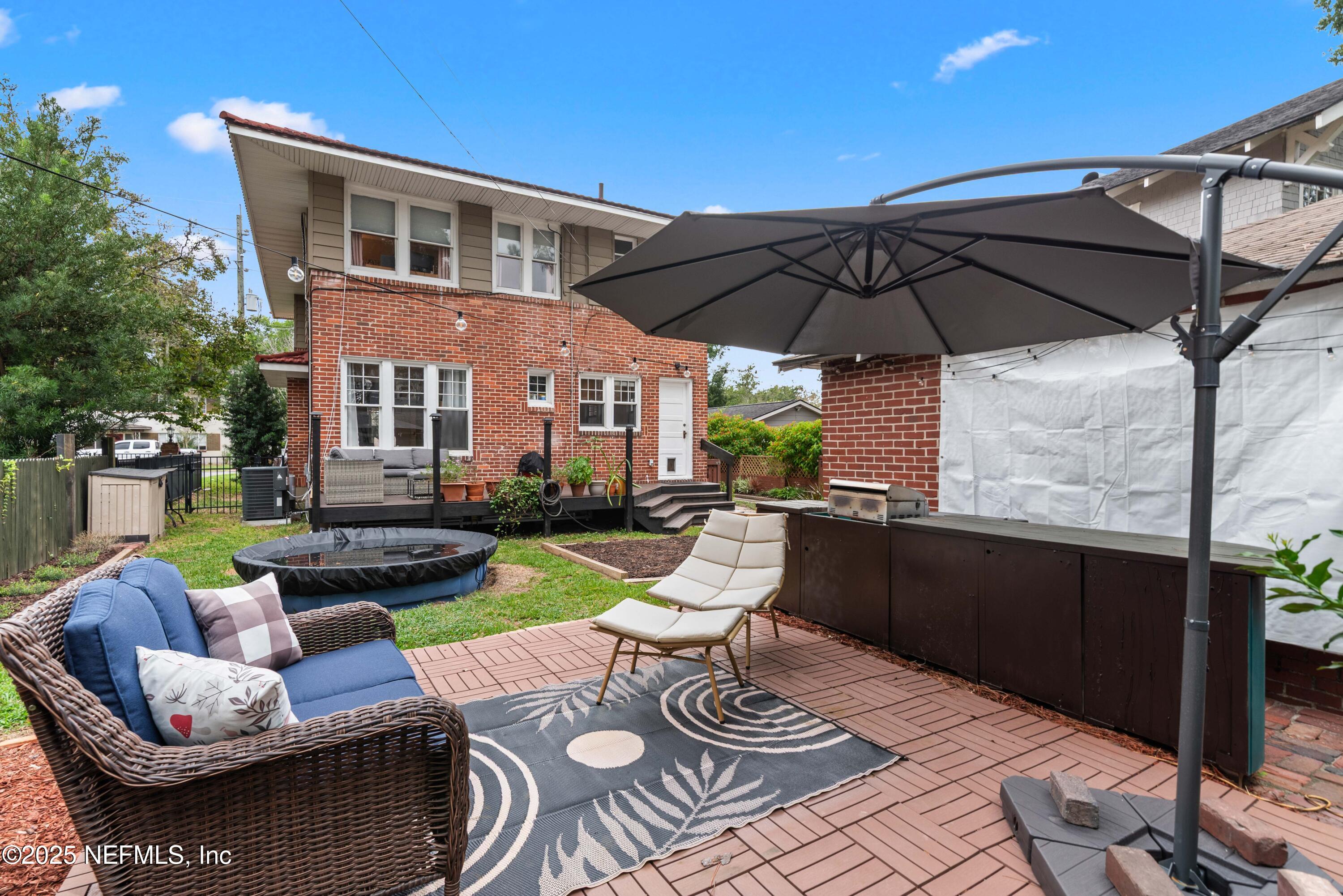 3023 Oak Street Jacksonville, FL 32205 - Photo 46 of 50 a patio with patio table and chairs